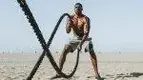 Guy-On-Beach-Battle-Ropes.webp Guy-On-Beach-Battle-Ropes.webp