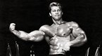 Mr Olympia legend and bodybuilder Larry Scott showing his tricep in a bodybuilding competition Mr Olympia legend and bodybuilder Larry Scott showing his tricep in a bodybuilding competition