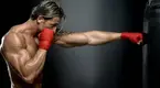 Muscular-Boxer-Punching-Heavy-Bag.webp Muscular-Boxer-Punching-Heavy-Bag.webp